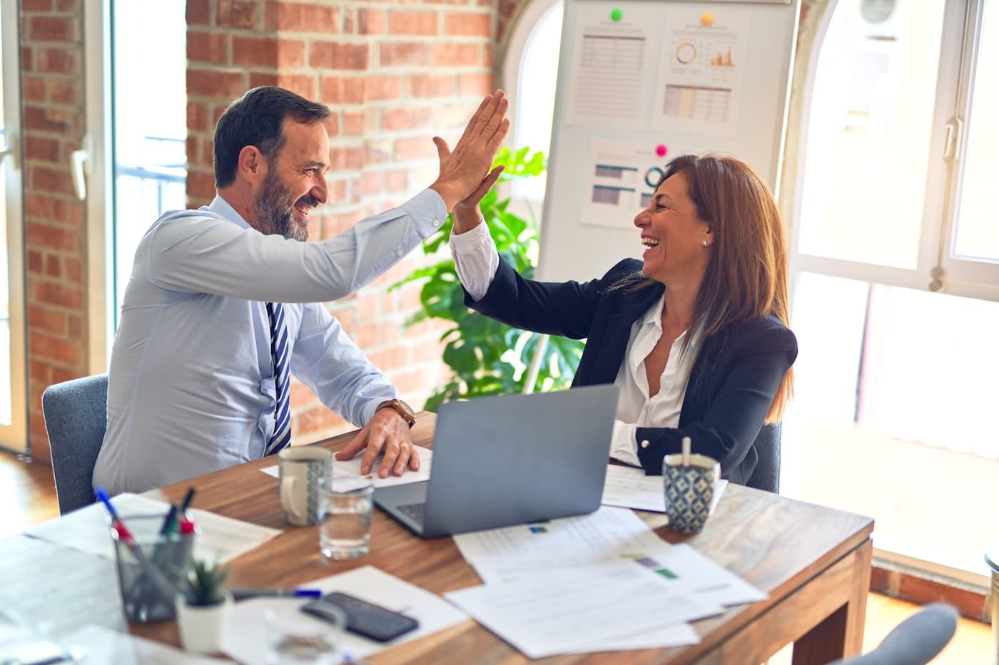 Professionals collaborating on a hiring brief